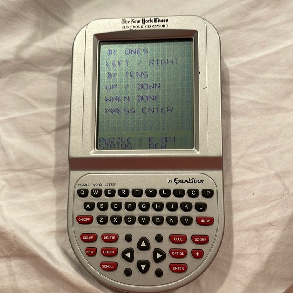 New York Times electronic crossword handheld game
